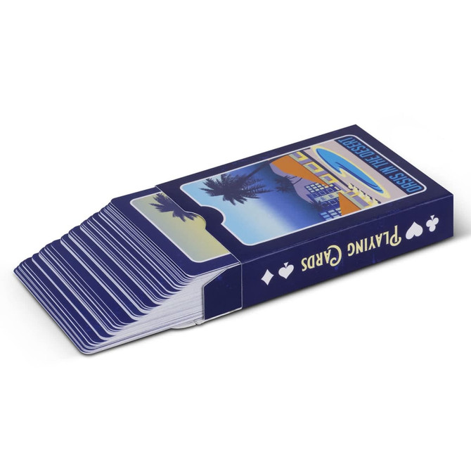 A deck of Vegas playing cards in a blue box featuring palm trees and a city skyline design.