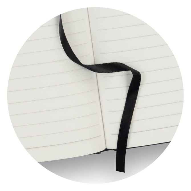 A black Petros Stone Paper Notebook with blank, lined pages and a black ribbon bookmark.