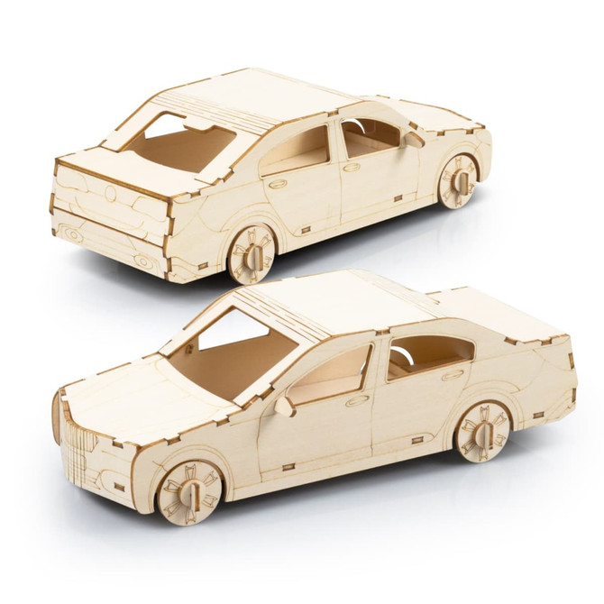 A wooden model of a sedan car in a natural wood finish, featuring detailed wheels and windows.