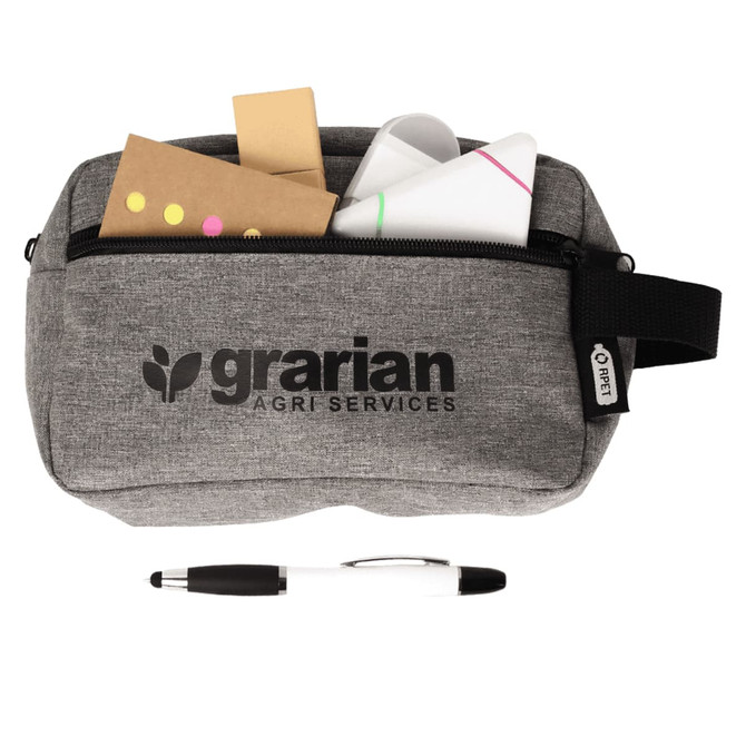 A grey stationery pouch with a logo, containing sticky notes, paper, and a black and white pen.