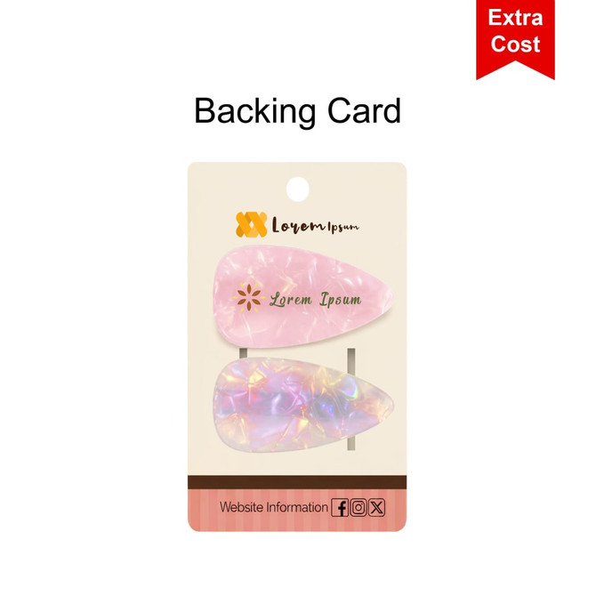 A backing card featuring two oval hair clips, one in pink and the other iridescent, with a logo displayed.