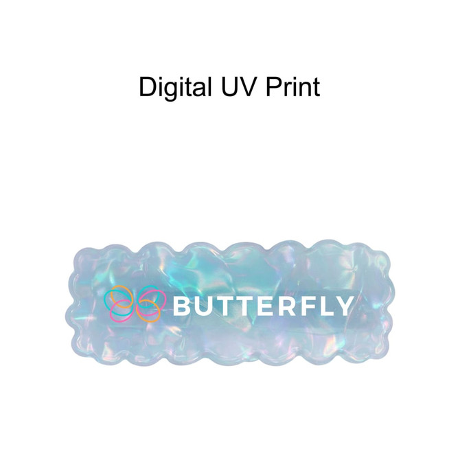 A wavy rectangle hair clip in iridescent hues, featuring a logo, with a glossy finish.