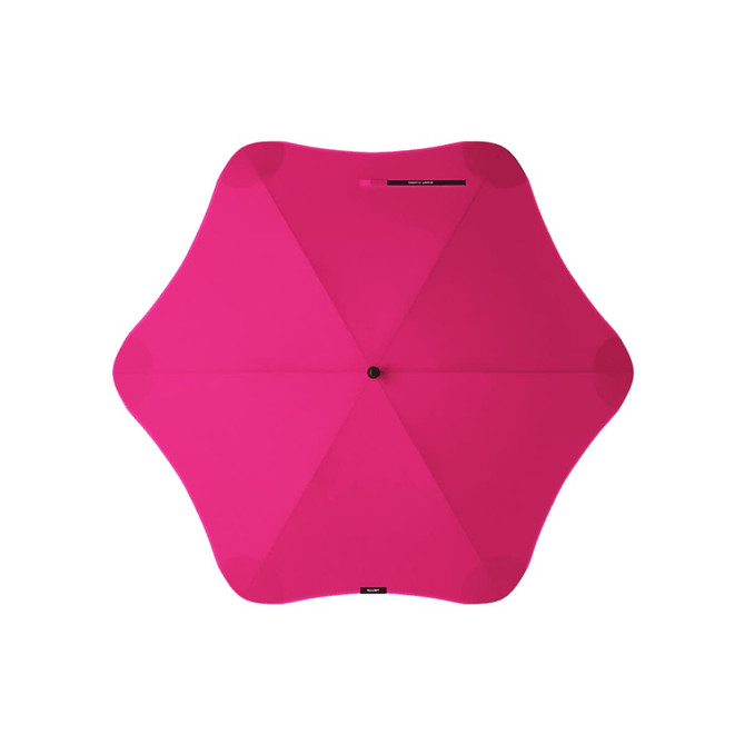A pink umbrella with a star-shaped design, featuring a central button and a brand logo.