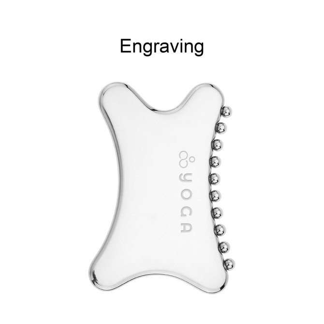 A transparent Gua Sha tool with a smooth surface and small beads on one edge, featuring a logo.