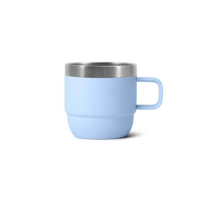 A stackable stainless steel mug in light blue with a stainless steel rim and a handle. It features a simple design.