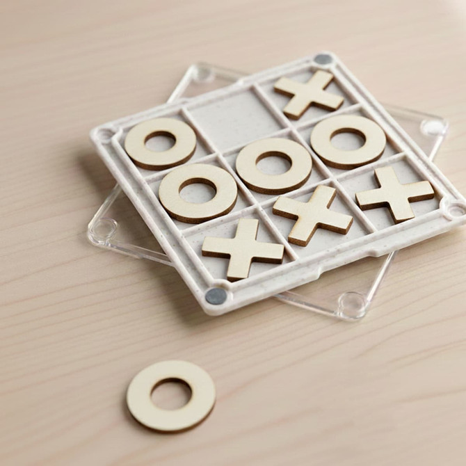 A Tic Tac Toe board game coaster with a clear base, featuring wooden X and O pieces in a grid pattern.