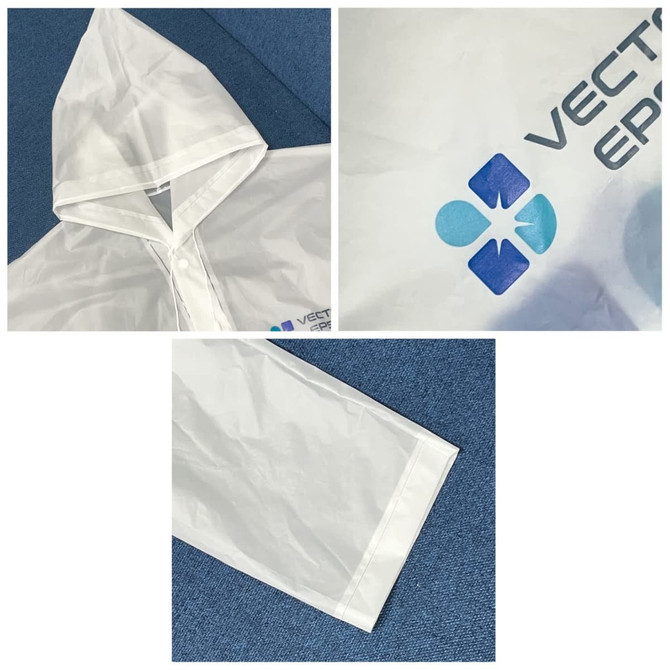 A white reusable digital print raincoat with a hood, featuring a logo, displayed on a blue background.