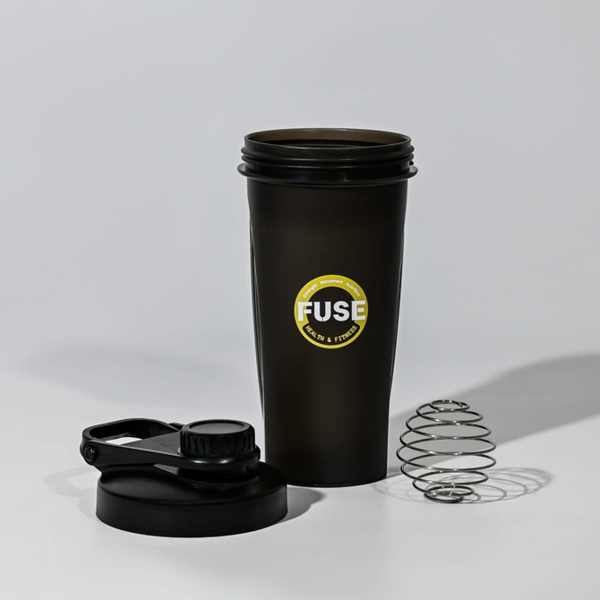 A drink bottle with a black and yellow design, featuring a lid and metal mixing ball. It has a logo on the side.