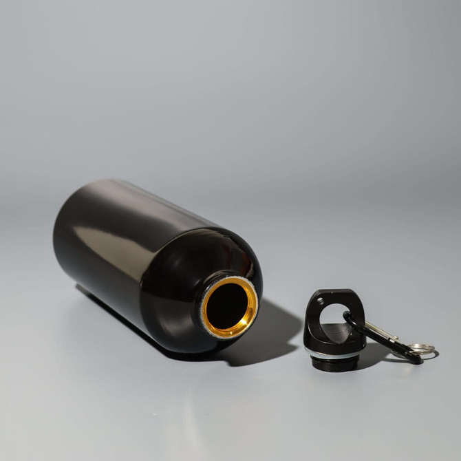 A drink bottle in black with a gold interior, accompanied by a lid and keyring attachment.