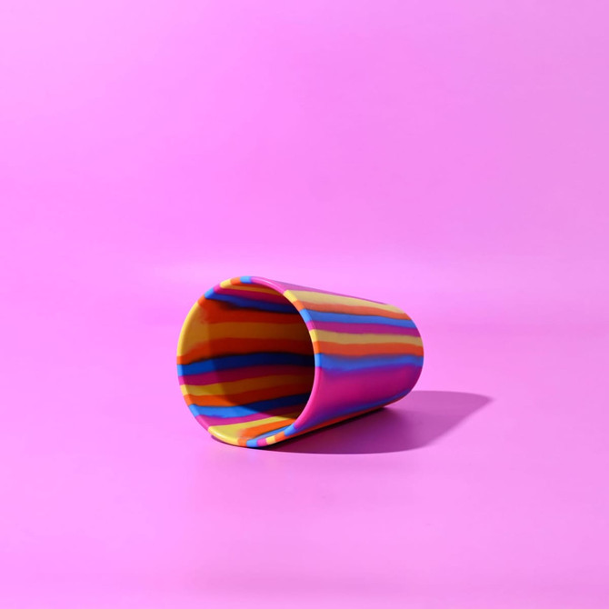 A drink bottle featuring a vibrant, multi-coloured swirl design in yellow, pink, and blue, with a smooth finish.