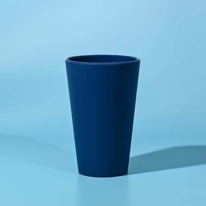 A drink bottle in a navy colour, featuring a simple design and a logo on the side.