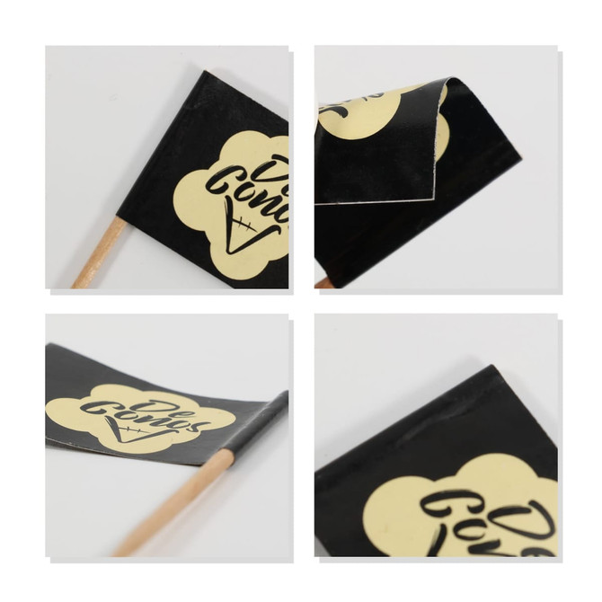 A pack of 100 coated paper flags in black and yellow, featuring a logo on each flag and wooden sticks.