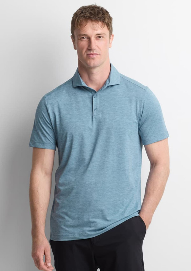 A men's short sleeve polo in a light blue colour, featuring a collar and a logo.