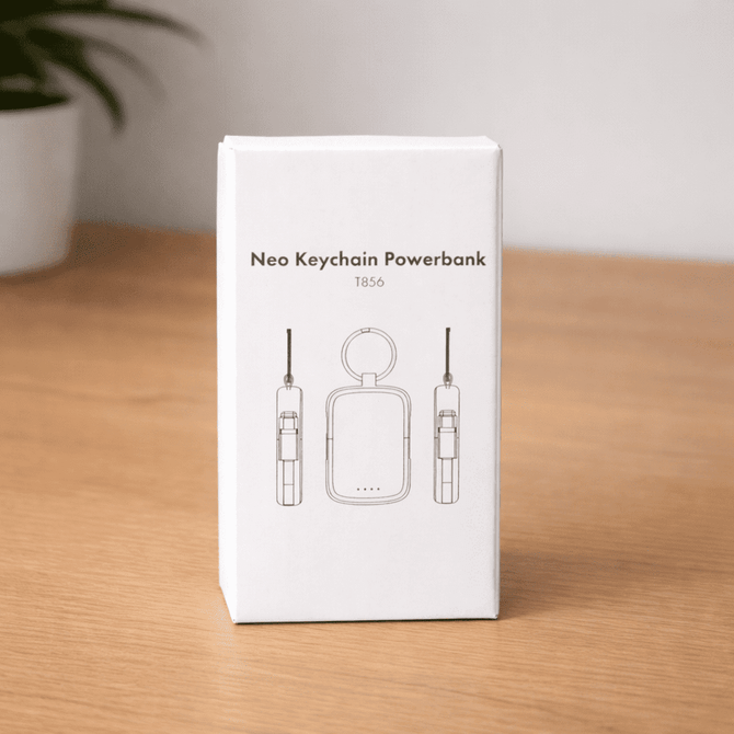 A white box containing the Neo Keychain Powerbank, featuring illustrations of the powerbank design and keychain attachment.