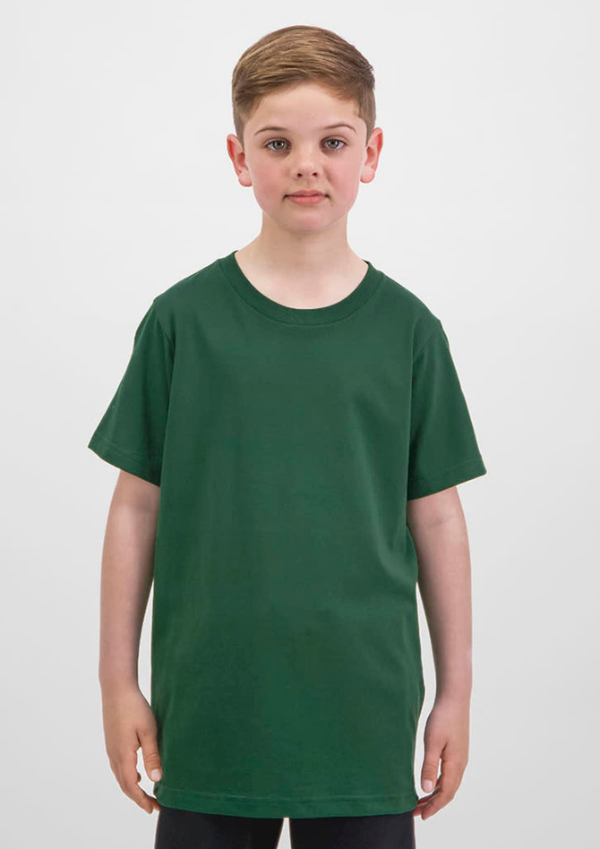 A green short sleeve tee for kids displayed on a young boy, featuring a simple design and a logo.