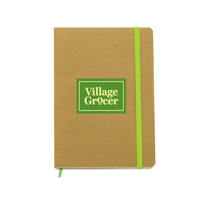 A tan notebook with a green elastic band and a logo on the front. It has a simple, minimalist design.