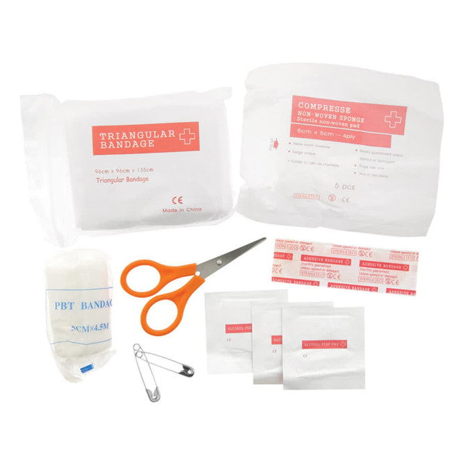 First Aid Travel Kit featuring white bandages, scissors with orange handles, and assorted medical supplies in clear packaging.