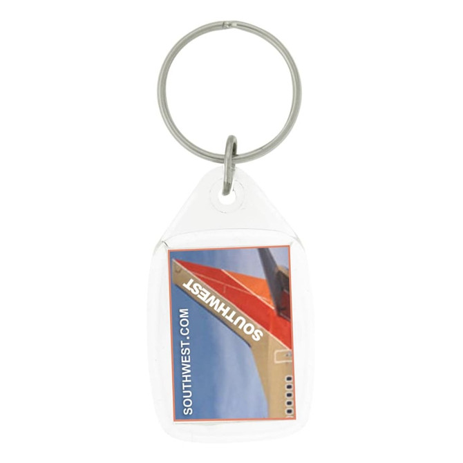 A clear tear drop acrylic keychain with a circular metal ring and a branding design featuring red and white colours.