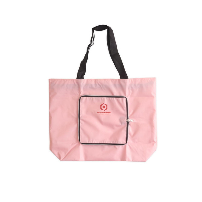 A pink foldable tote bag with black handles and a front zippered pocket. It features a logo on the front.