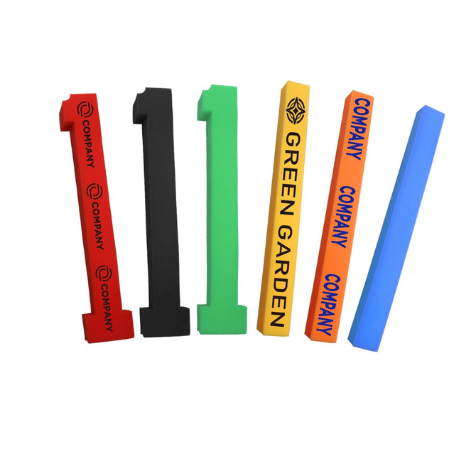 A set of colourful sponge sticks in red, black, green, orange, blue, and yellow, featuring various branding.
