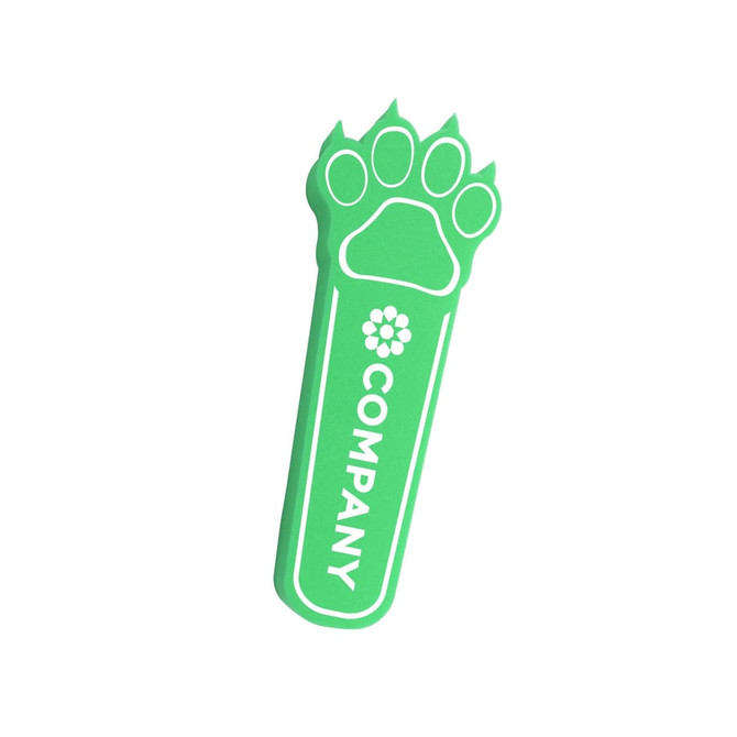 A green paw-shaped drink stirrer with a logo on it.
