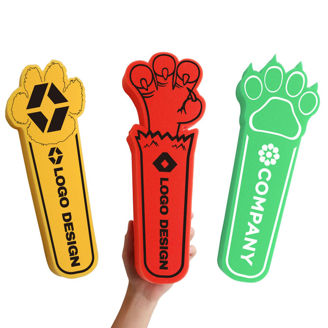 Three foam sticks featuring paw print designs in yellow, red, and green, each with a logo.