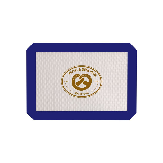 A silicone baking mat in white with a blue border and a circular logo in the centre.