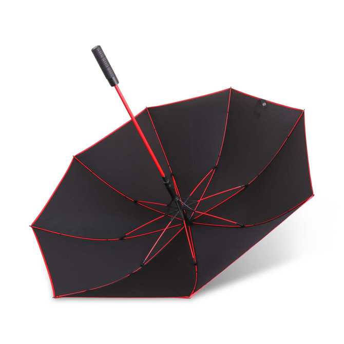 A black umbrella with red trim and a black handle, featuring a central pole and an open canopy design.