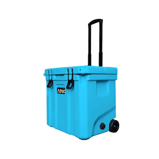 A blue cooler box with wheels and a retractable handle, featuring a logo on the front.