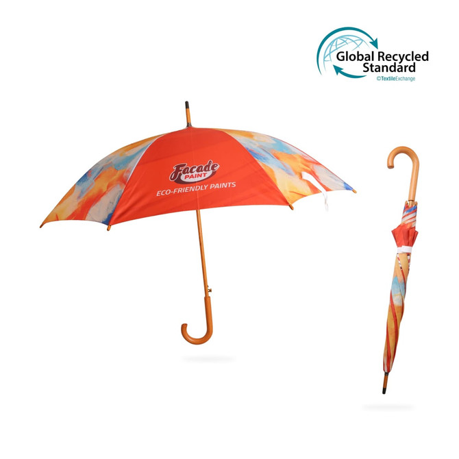 An eco-friendly umbrella in vibrant orange with a curved wooden handle, featuring a colourful abstract design.