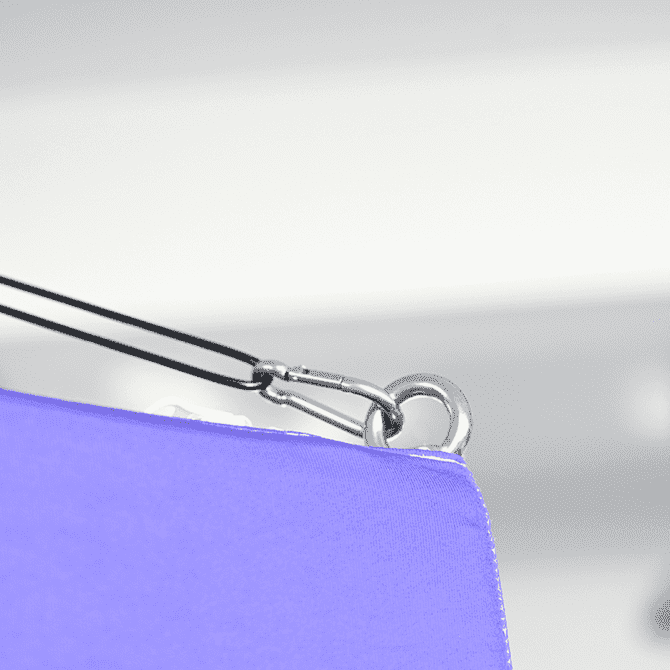 A square hanging banner in vibrant purple, featuring a hook and attachment point for display.