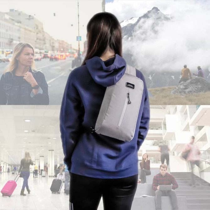 A grey Sling Eco Bag is worn over the shoulder by a person, set against scenic outdoor and urban backgrounds.