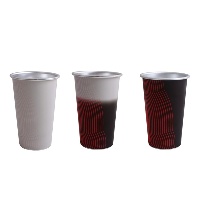 A set of three aluminium cups in white, gradient grey, and black with red linear patterns. Each cup has a metallic finish.