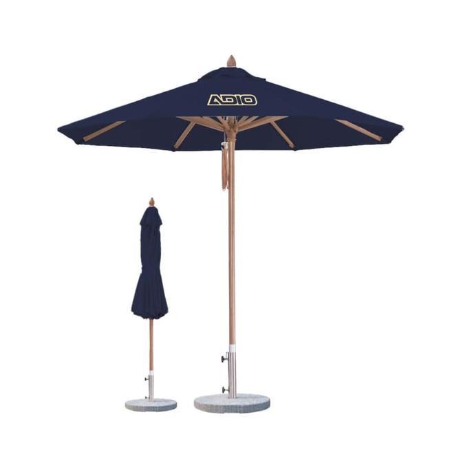 A navy blue wind-resistant octagon outdoor umbrella with a wooden frame and a base. It includes a folded umbrella.