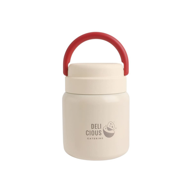 A stainless steel vacuum insulated food jar in cream with a red handle, featuring a logo on the front.