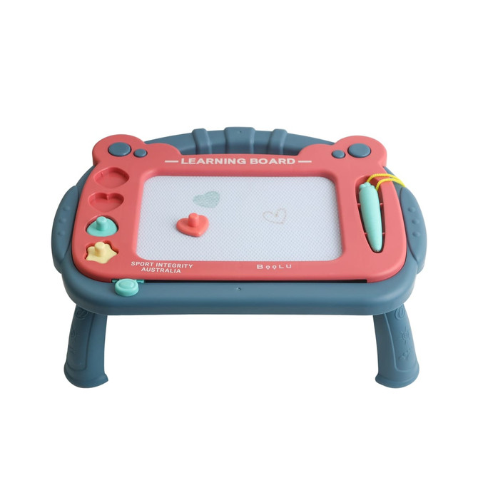 A magnetic drawing board with a teal and pink design, featuring a stand and a stylus, along with various shapes.