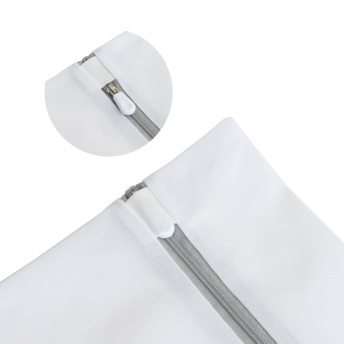 A white mesh laundry bag with a zipper closure and a circular inset highlighting the zipper detail.