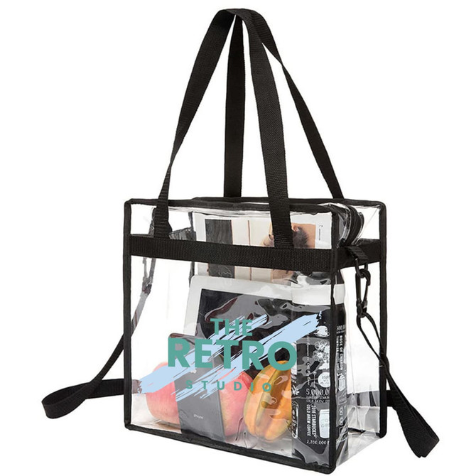 A transparent tote bag with a black shoulder strap, featuring various items inside and a logo on the front.