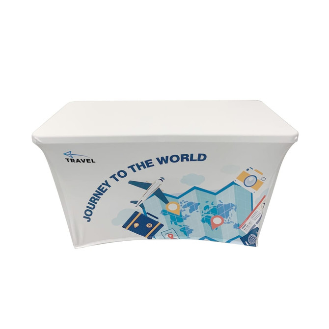 A white stretch table cover featuring travel-themed graphics and a logo on one side.