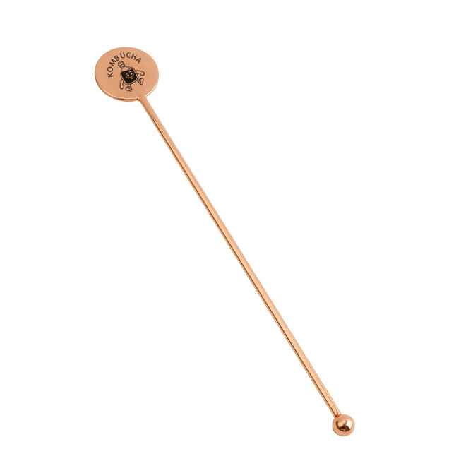 A stainless steel cocktail drink stirrer in copper colour, featuring a round top with a logo.