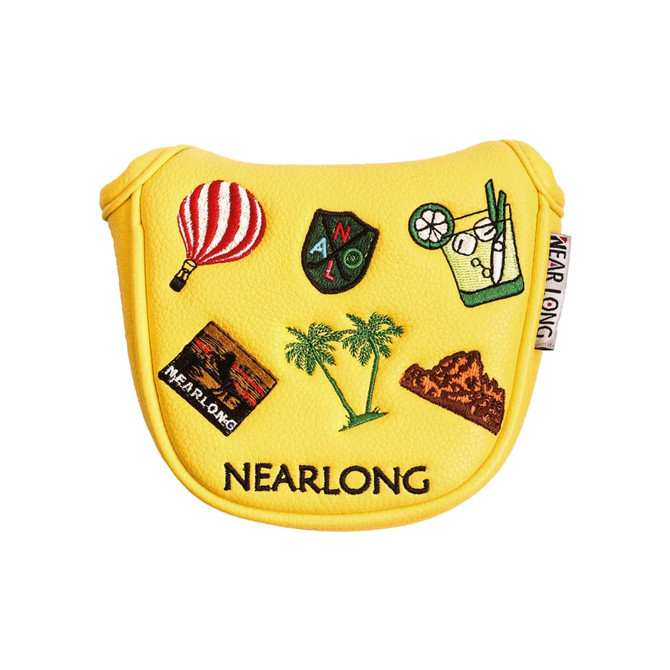 A yellow custom mallet putter cover featuring various embroidered designs, including a hot air balloon, palm trees, and a drink.