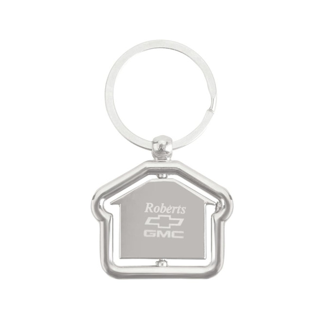 A silver metal keyring in the shape of a house, with a circular keyring attachment.