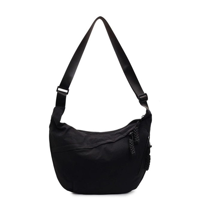 A black crossbody bag with a sleek design and adjustable strap, featuring a side zipper and logo.