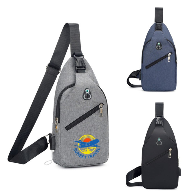 A grey, navy, and black sling chest bag with a logo, featuring zippered compartments and an adjustable strap.