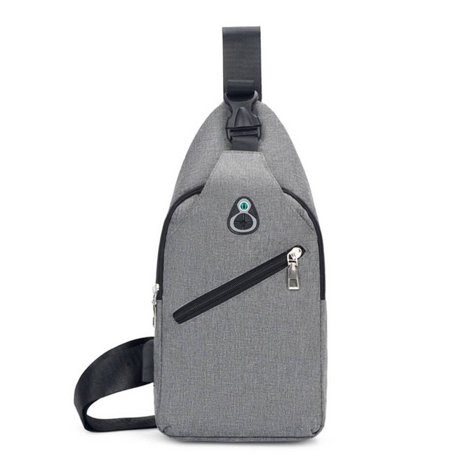 A grey sling chest bag with a zippered pocket and adjustable strap, featuring a logo on the front.
