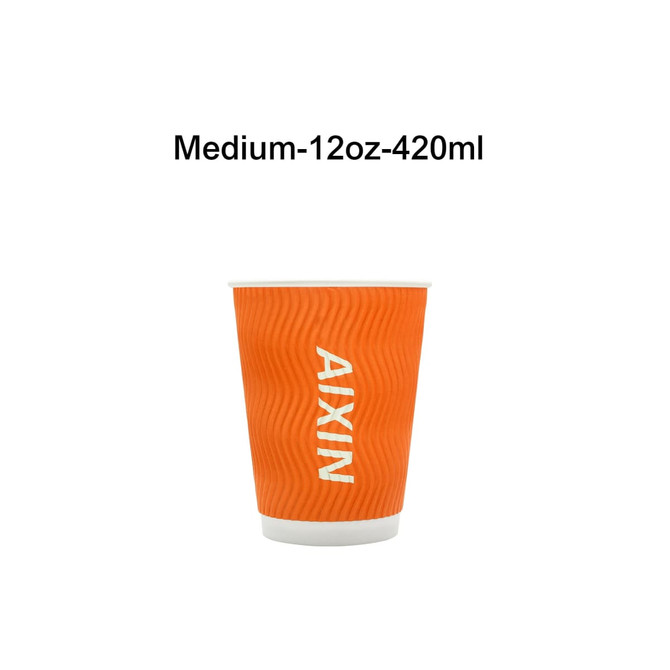 An orange corrugated double wall paper cup with a ribbed texture, featuring a logo on the front.