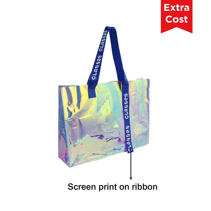 A colourful transparent PVC tote bag with a reflective surface and blue ribbon handles featuring a logo.