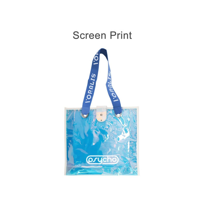 An iridescent clear tote bag with blue handles and a logo, featuring a shiny, transparent finish.