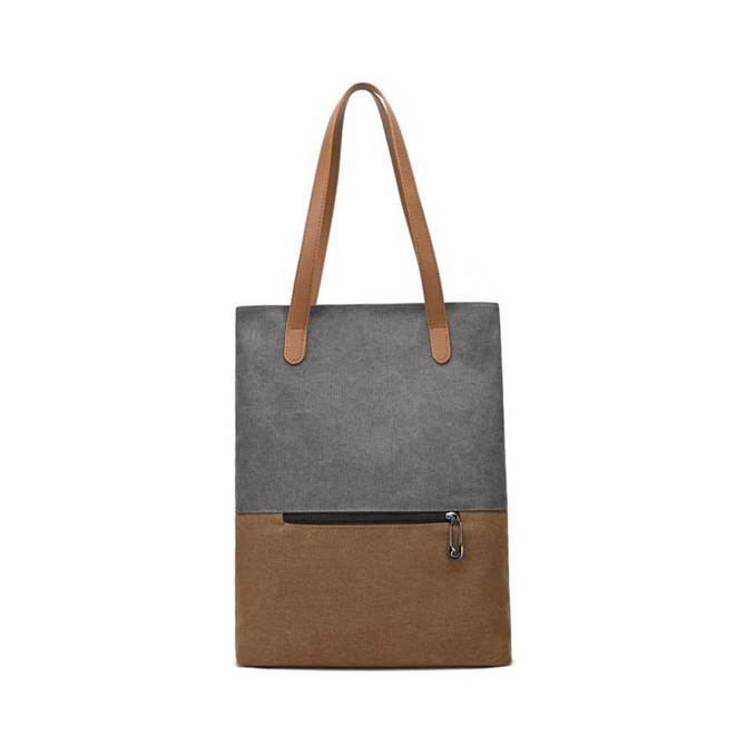 A grey and brown convertible canvas backpack that can be transformed into a tote bag. It features long straps and a zip pocket.