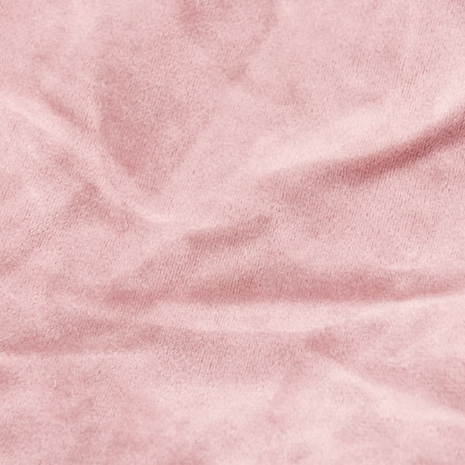 A close-up of soft, pink velvet fabric with subtle texture and creases.
